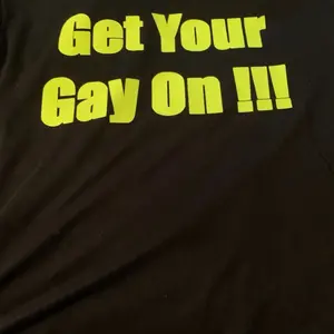 Get Your Gay On!!! - Black T-shirt with Yellow text