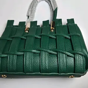 Elegant Green Woven Leather Tote Bag with Gold Accents and Durable Handles for Everyday Use
