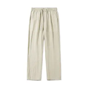 Summer men’s relaxed linen blend straight-leg casual pants made from natural linen textured fabric, elastic waistband with drawstring for adjustable waist, minimalist non-restrictive slant pockets, drapey wrinkle-resistant wide-leg design—ideal for everyd