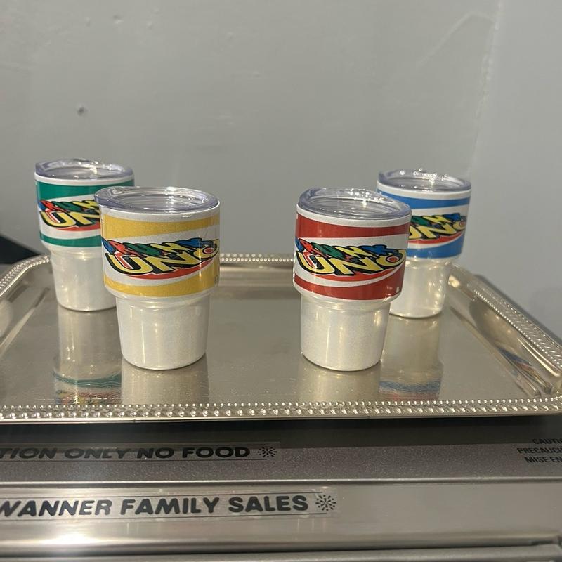 Drunk Uno with everything needed for 4 players.