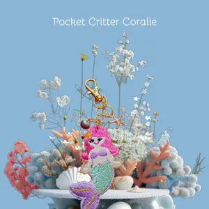 Pocket Critter Coralie Mermaid Keychain with Pink Hair and Teal Tail for Aquatic Themed Accessories