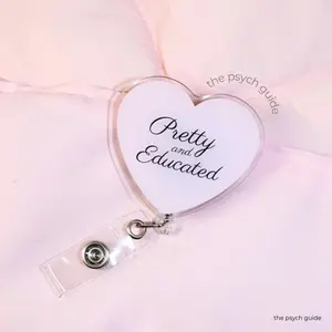 pretty and educated badge reel | baby pink heart shaped badge reel for students, nurses, healthcare workers | the psych guide pretty and educated badge reel