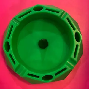 Silicon Ashtray with compartments for dab tools and convenient ash dabbing spike in middle of ash tray.