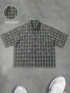 Men's black and white checkered rhinestone printed short sleeved shirt, sparkling star patterned printed clothing, loose shoulder design, suitable for casual street style, party night wear, suitable for Y2K style and fashion enthusiasts