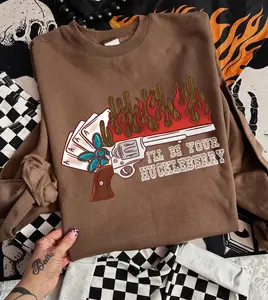 I'll Be Your Huckleberry Western Sweatshirt, Wild West Cowgirl Clothing, Flaming Revolver Graphic Crewneck, Edgy Desert Vibes Pullover, Sassy Country Girl Fashion, Tombstone Quote Outfits, Turquoise Accents Frontier Jumper