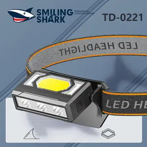 【TD-0221】 Smiling Shark multifunctional headlamp is made of ABS material, features two light source modes, and allows for 90° free adjustment, meeting the needs of everyday use!