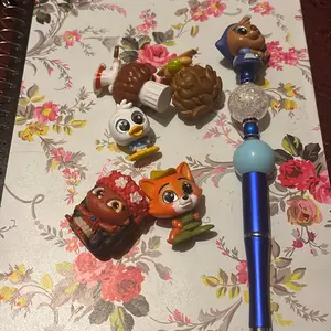 Custom pen toppers live