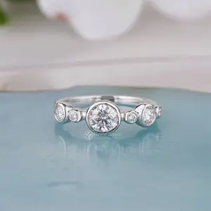 Unique Bezel Set Round Cut Moissanite Wedding Band