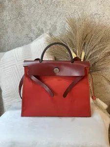 Pre-owned HERMÈS Herbag in Red Canvas & Leather 1919H0592