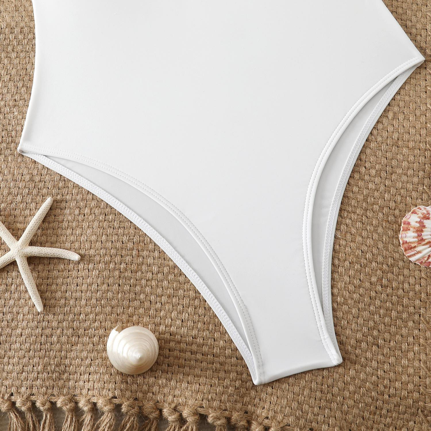 European and American sexy slim-fit women's swimwear wholesale in Xingcheng, nylon swimsuit with metal shell decoration, one-piece swimsuit