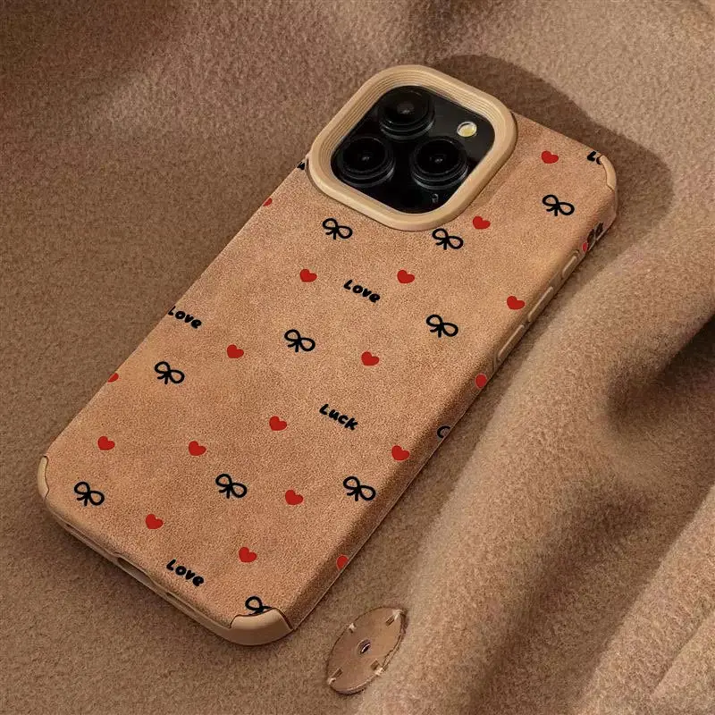 Cute Love Heart Bow iPhone Case - TPU Leather Anti-Fingerprint Shockproof Soft Case for iPhone 17/16/15 Pro Max/14 Plus/13/12/11 Pro/Air