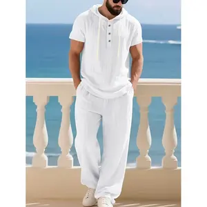 2-piece men’s set: short-sleeve hooded Henley shirt + elastic-waist long pants. Lightweight, breathable casual summer outfit suitable for vacations, the beach, and everyday wear.