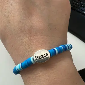 Blue bracelet movement - peace- Kamala- fight