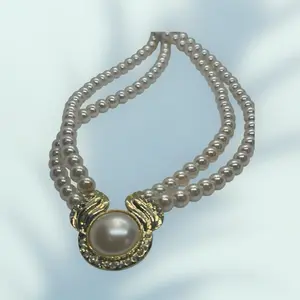 Custom Made Pearl Necklace with Pearl Beads and Decorative Pendant in Silver Finish