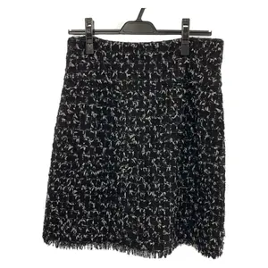 Pre-owned CHANEL Wool Small Leather Goods Coco Mark Tweed Skirt