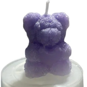 Bear with a heart candle
