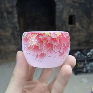 Handmade glass cup with pink flowers