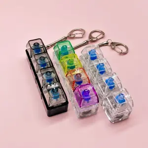 4-key decompression button, Russian Tetris keychain, mechanical key with light-emitting function, stress-reducing fingertip toy key.