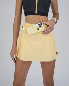 FLIPBELT Running Skort - Pink A-Line Skirt with High-Rise Compression & Reflective Details for Long-Distance Performance