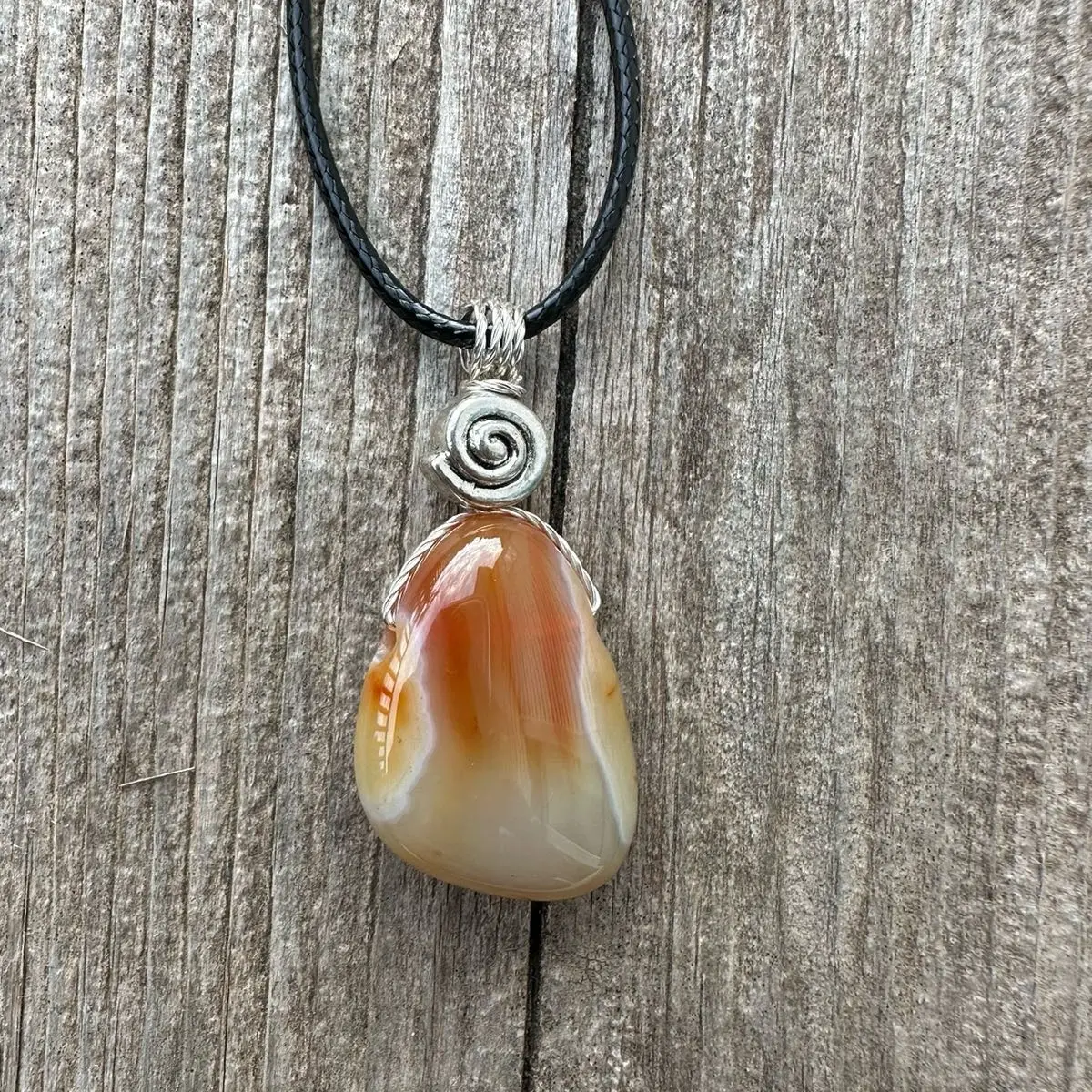 Carnelian Necklace Motivation, Creativity, and Courage. Swirl to Signify Consciousness.