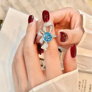 Adjustable opening ring Premium inlaid colored treasure sky sapphire wrapped flower ring