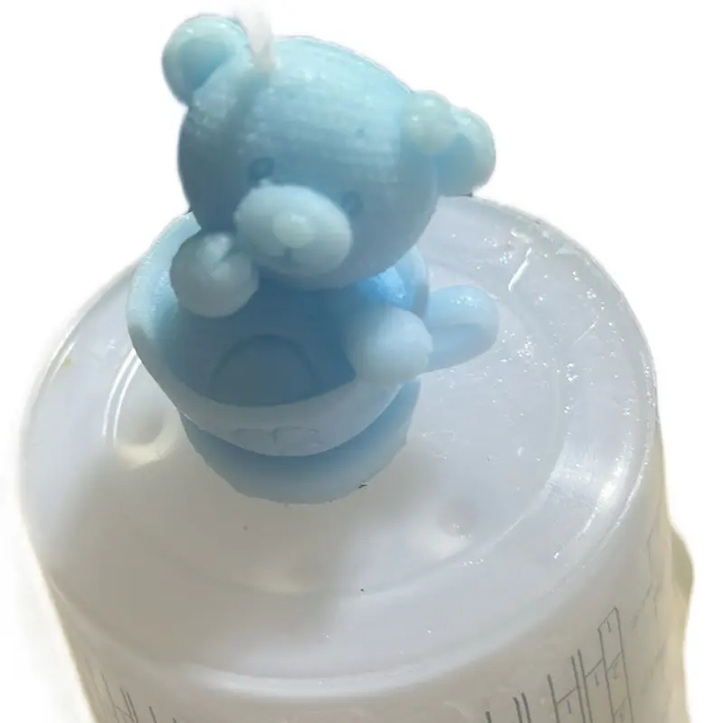 Bear in a cup candle le