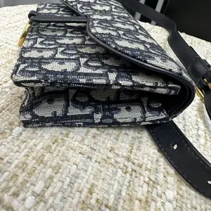 Pre-owned Dior Smooth black calfskin leather trim Shoulder Bags Saddle Wallet On Chain（82684944）