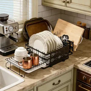 SICANDAENHK Tired of wet, messy dishes taking over your counter?This compact 2-tier extendable dish rack is the perfect solution!With a built-in drying tray, separate utensil and cup holders, high-quality stainless steel material, easy drainage