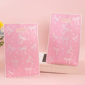 50 Plastic Gift Bags with Bow and Star Print, Has Handle Design, Perfect for Girl's Style Occasions, Birthday Party, Gift Wrapping Supplies