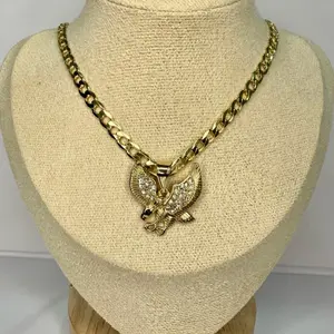 A42. eagle pendant with chain, size 24./ laminado 14k