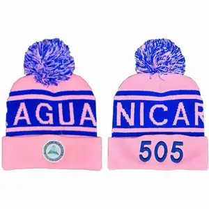Beanie Nicaragua Pink Color with Aguani 505 Logo and Blue Pom-Pom for Stylish Warmth