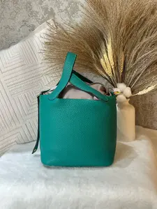 Pre-owned HERMÈS Picotin Lock handbag in striking emerald green Togo leather 1919H0616