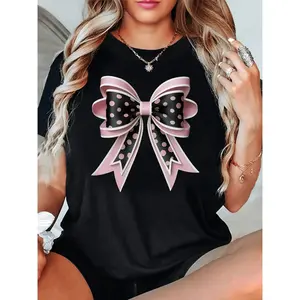 Graphic T-shirtCharming Pink Bow Short Sleeve Crew Neck T-Shirt Featuring Polka Dots and Comfortable Stretch |   cute bow tee, pink aesthetic shirt, casual summer top, womens graphic tee, soft comfy t-shirt, trendy TikTok style
