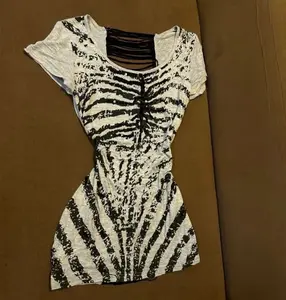 Aesthetic Cyber Grunge Collection | Skeleton Graphic Bodycon Dresses, Gothic Punk Distressed Tees, Multi-Zipper Hollow Out Tanks, Retro Cross Print Streetwear, Alternative Alt-Fashion Outfits