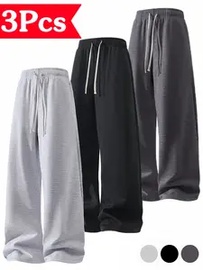 3-pack solid-color men’s fitness pants for spring/autumn; loose straight-leg long pants made from soft, slightly stretchy knit fabric with a drawstring waist—ideal for outdoor casual wear and sportswear.