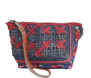 Harlow Moon in Hanoi with Brown Leather Wristlet