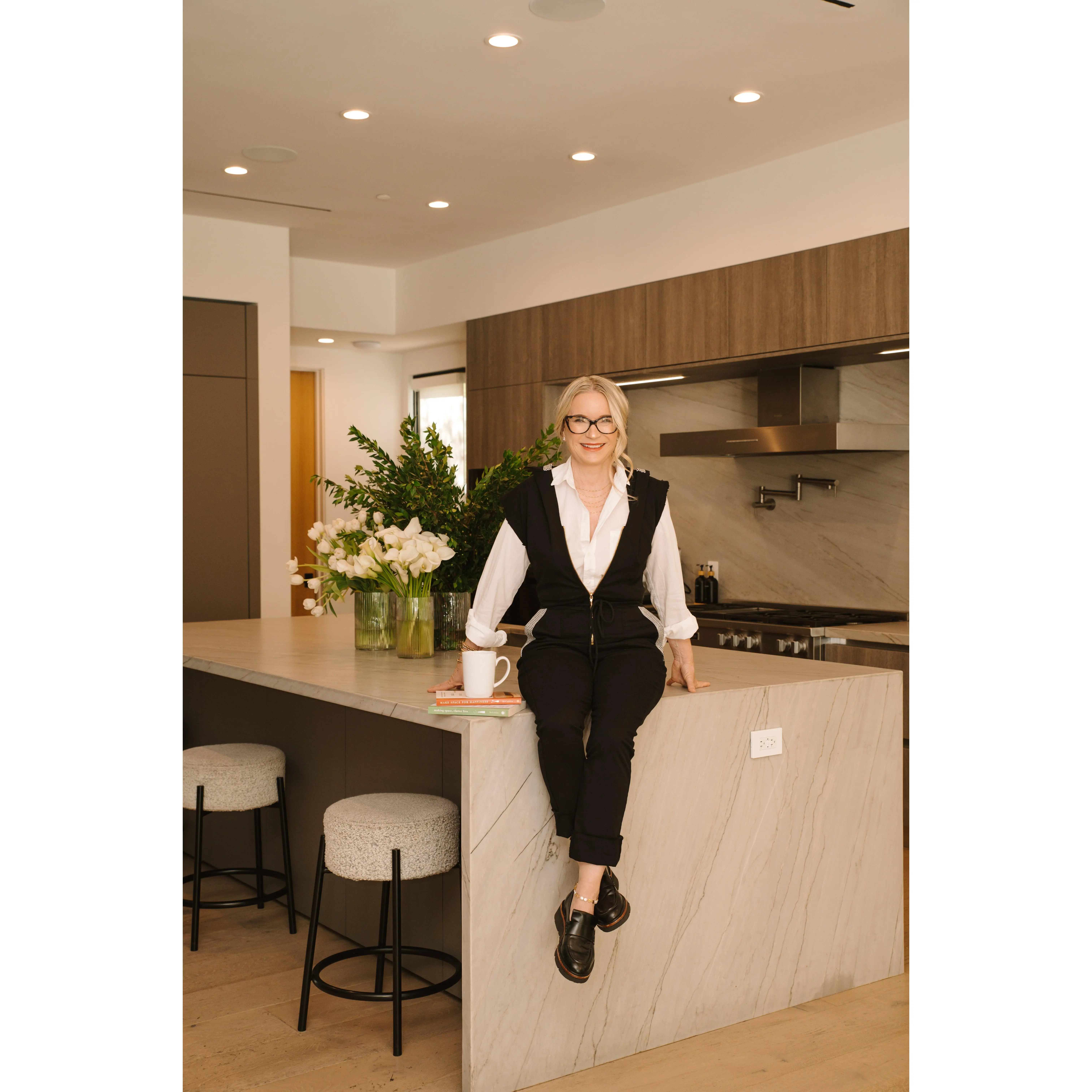 The Carly Hooded Denim Jumpsuit in Black