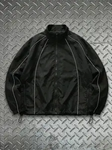 Functional windproof hooded jacket with reflective stripes — loose, versatile streetwear casual outerwear; high‑street athletic jacket with a short, wide fit.