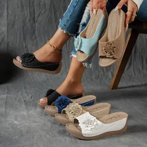 Women’s floral-embellished sandals — slip-on open design with breathable synthetic leather upper and EVA sole; suitable for beach vacations, casual outings; thick wedge heel; comfortable, elegant footwear for all seasons.