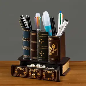A Single Vintage Pen Holder Designed As a Creative Organizer for Remote Controls, Resembling a Book. This Wooden Pen Holder Features a Drawer And Serves As a Decorative Ornament for The Desktop, Making It a Charming Gift in a Retro Style