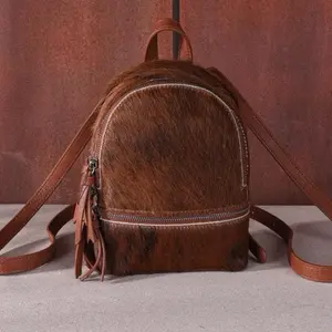 Montana West Trinity Ranch Cowhide Mini Backpack Genuine Hair-on Cowhide Dual Zipper Compartment with Logo Patch and Adjustable Straps