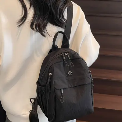 baggalini mini sling backpack Baggallini Double Zip Mini Sling Bag