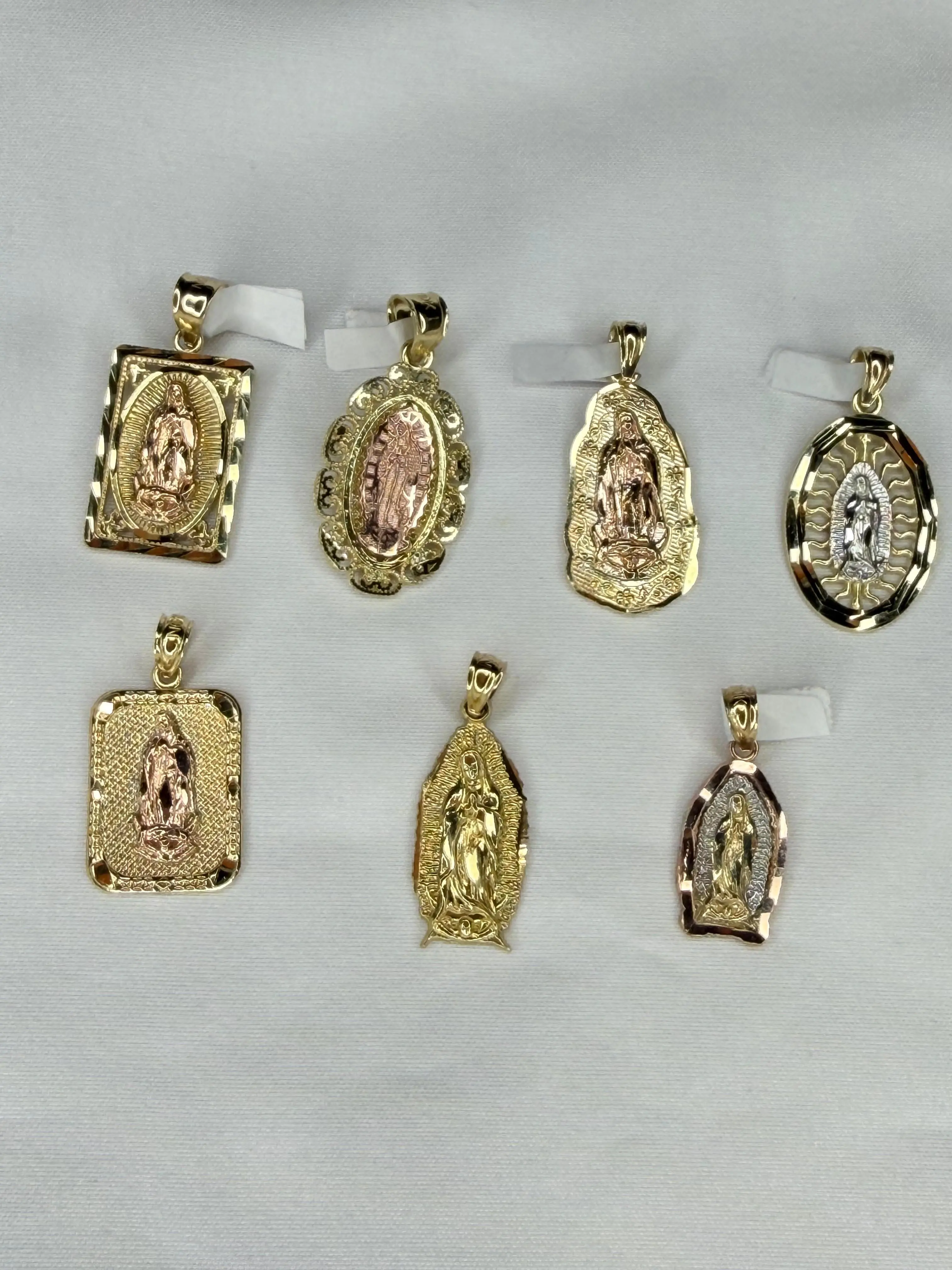 Elegantes y hermosos dijes de la virgen de guadalupe en oro real de 10k , con detalles en oro rosa y oro blanco