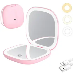 LED magnifying travel makeup mirror, 1x/2x magnification, compact portable pocket-sized with adjustable brightness, dual-sided USB rechargeable touchscreen, portable and suitable as a gift.