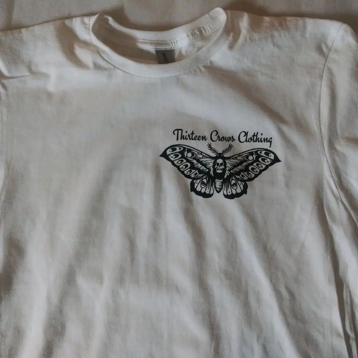 DeathMoth- White w\Black design. pocket & back. Unisex Crew Neck Cotton White