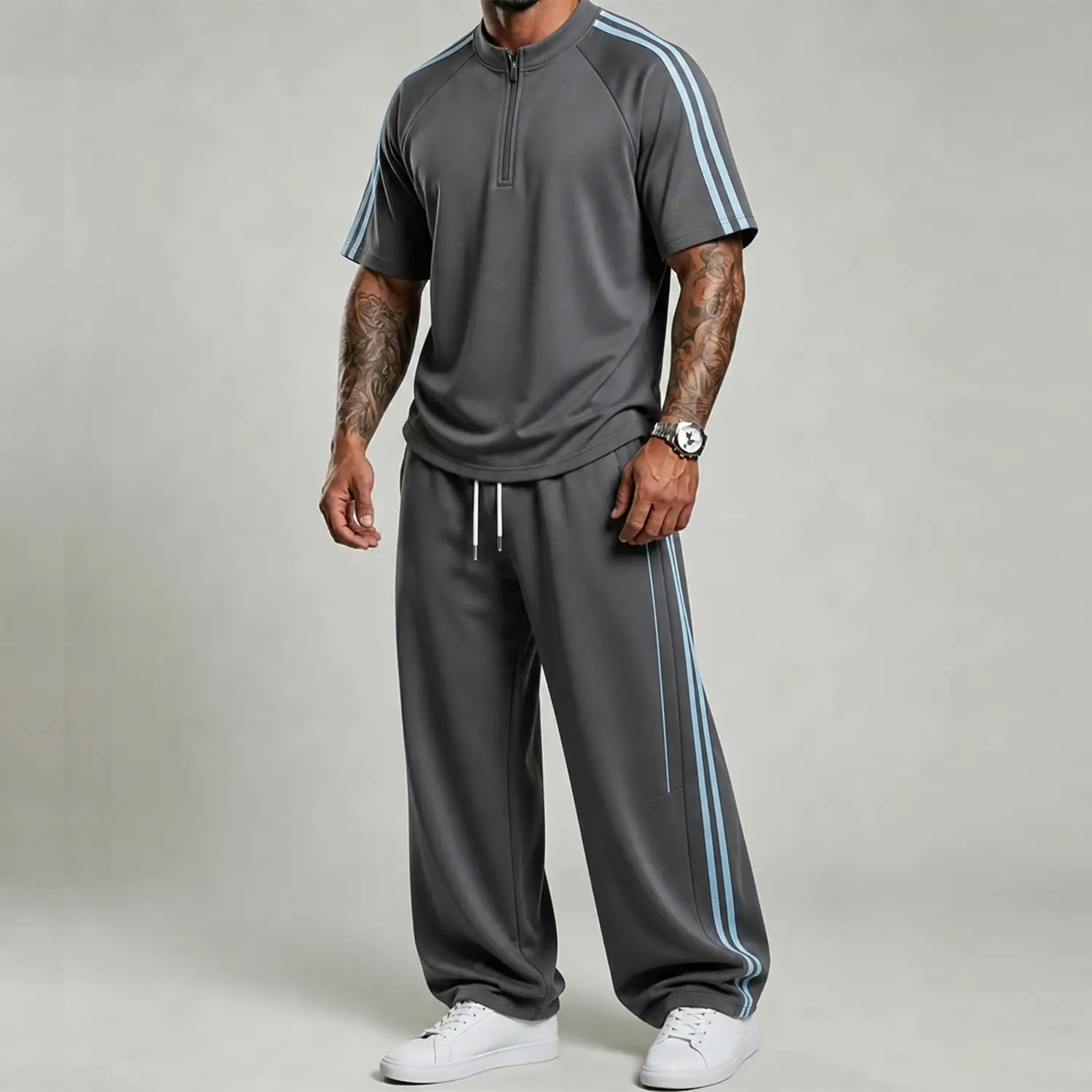 Men’s set featuring panel construction with side stripe design; casual loose short-sleeve top and long pants with an elastic waistband, suitable for gym workouts and everyday wear—casual sportswear.