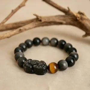 Unisex beaded bracelet featuring a wealth-attracting Pixiu charm; symbolizes attracting wealth, bringing blessings, and ensuring peace and safety, rooted in traditional Taoist culture from China.