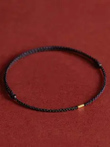 This minimalist handmade lucky bracelet features red and black threads and an adjustable design-great for men, women,and as a gift for someone special