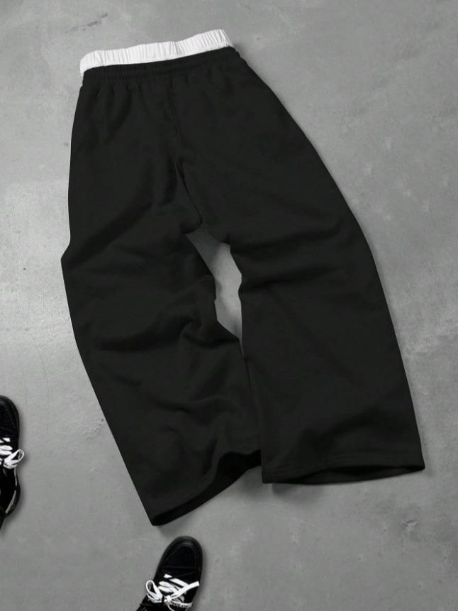 Gray sweatpants with embroidered logo, Y2K American street casual joggers, loose casual knitted sports pants featuring a drawstring and faux two-piece design with contrasting double waistband, perfect for everyday wear and trendy gatherings.