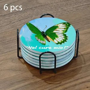 6-piece ceramic coaster set, featuring a beautiful butterfly design on a gradient blue background. These heat-resistant, non-slip coasters come with a holder, making them perfect for home or dining table decorations, and elegant beverage mats.
